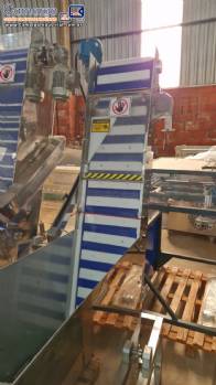 Alimentador posicionador abastecedor vibrat�rio em a�o inox de tampas TecnoEnvase TAG 5000