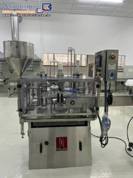 Envasadora dosadora volumétrica com seladora e tampadora em inox Delgo 2000 potes por hora